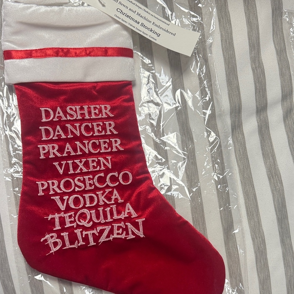 Hand Crafted boozy Christmas Stocking or gift wrap a bottle of wine in red velve